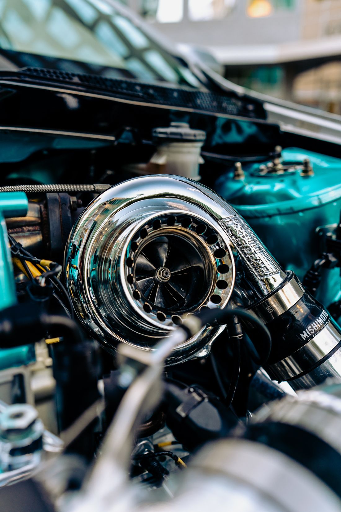 Polished turbocharger in a tuned engine bay